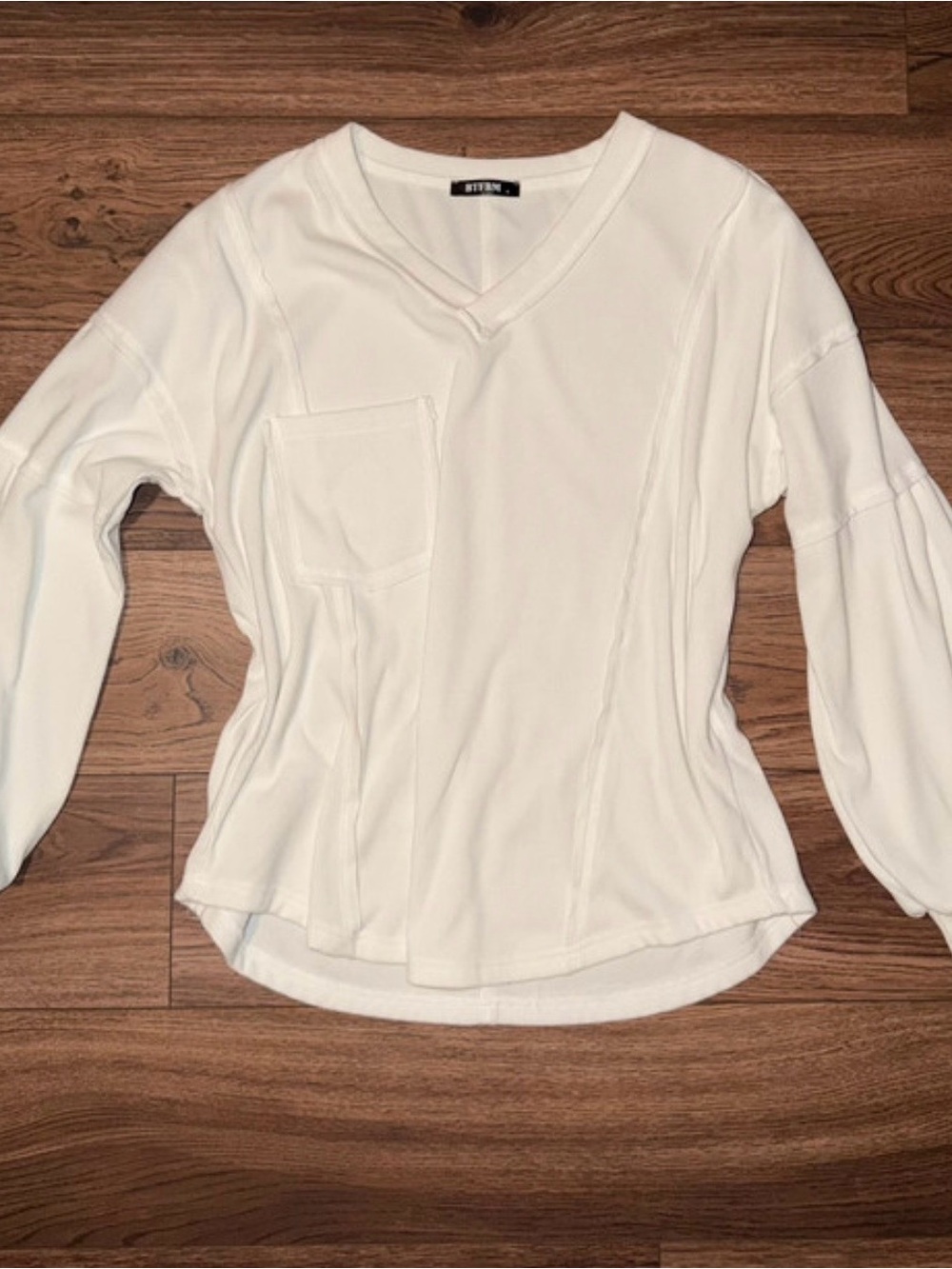 Ribbed V-Neck Long Sleeve Top in White -